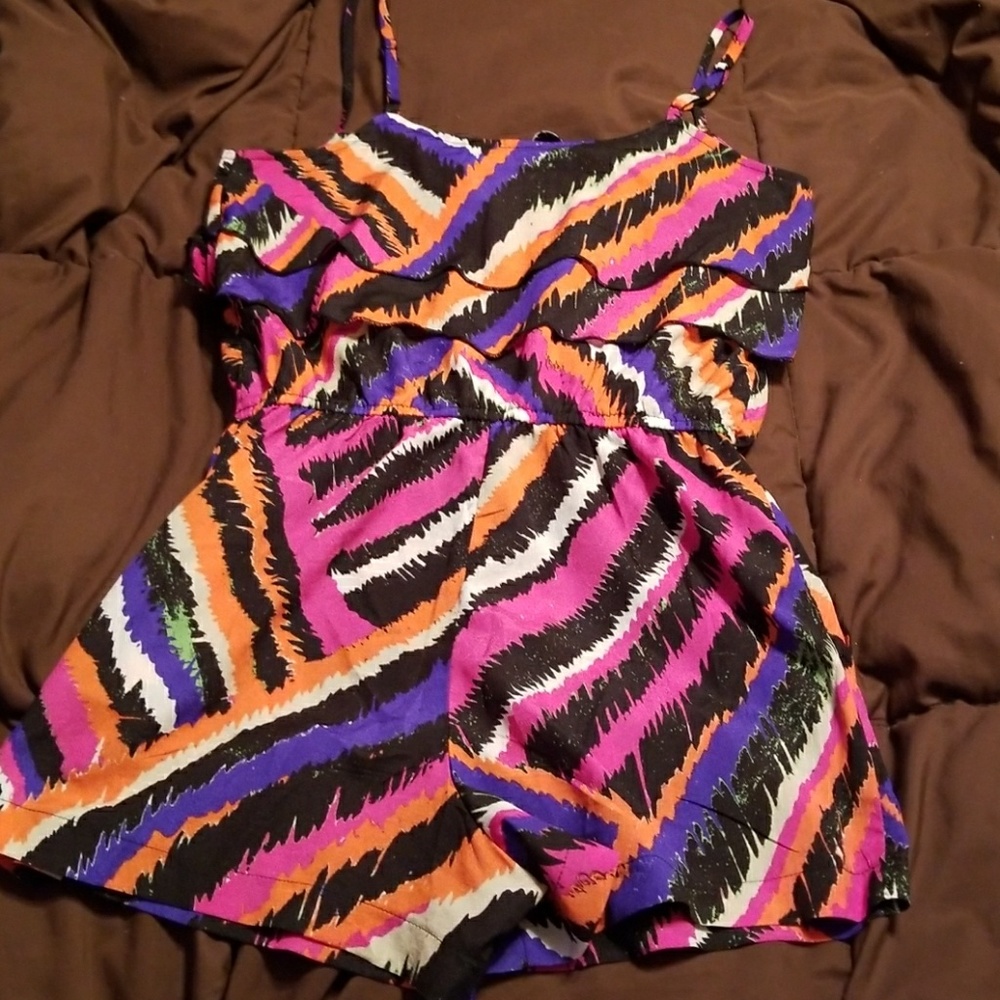 Beautiful romper.
